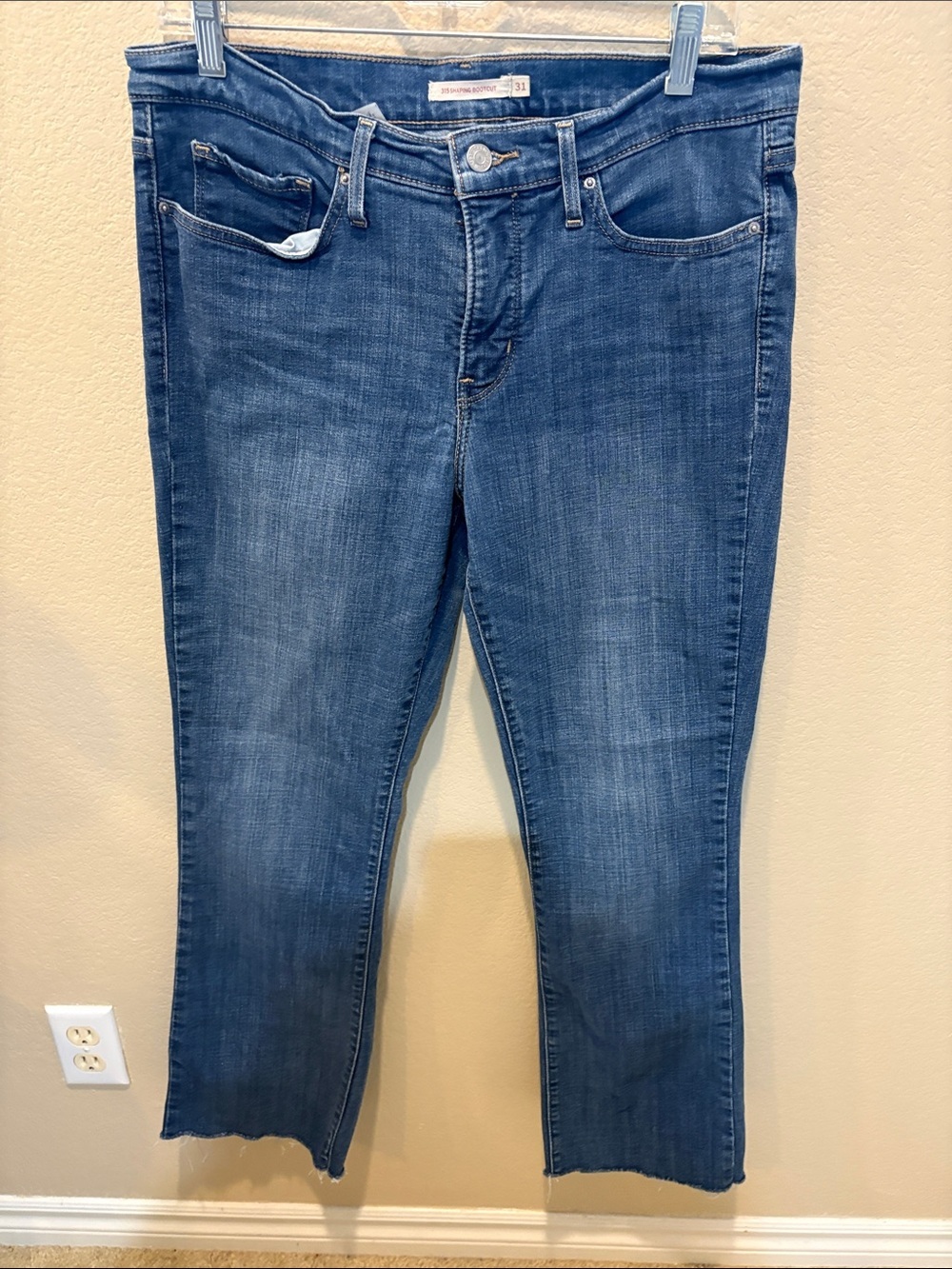 Levi's Women's 315 Shaping Boot Cut Jeans in Mid Blue Wash